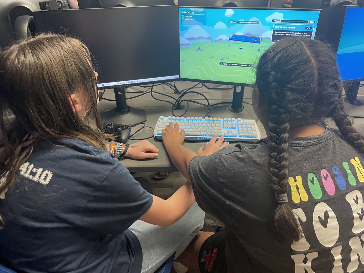 Today we had after school visitors in @wearesparknc lab! Some of our current Spark girls mentored some future Spark girls on game development.