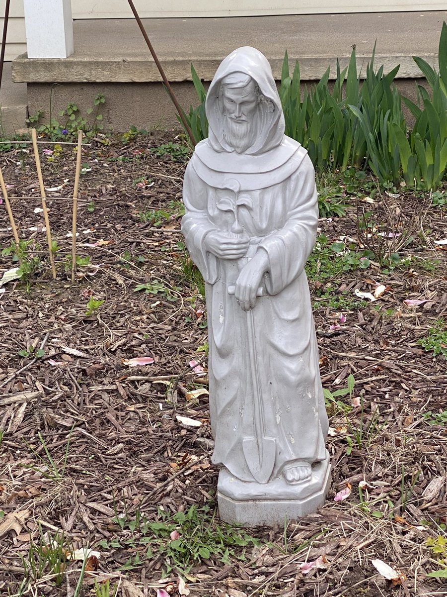 This is St Fiacre. A staple of my mother's garden, my parents repeatedly backed over it & the H kept repairing it. The last time, he repainted it, filled it with concrete & put a piece of rebar in as an anchor. 'That ought to hold the sucker' he prayed. And so it did.