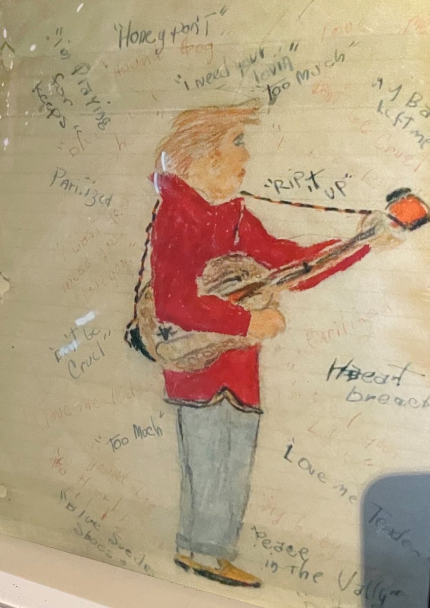 Glitch in the matrix: Here’s a drawing of Elvis that Jimi Hendrix made as a child, on display at Graceland. Elvis sure looks like … uhhh … someone else.