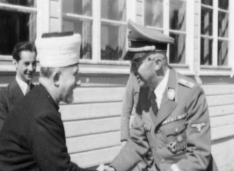 Let's educate some on Palestine This was the leader of Palestine In this photo, he was meeting with Himmler at a concentration camp. Mufti was going to build a camp in the Middle East. Until Hitler got wrecked. They were going to exterminate all the Jews of Israel together.