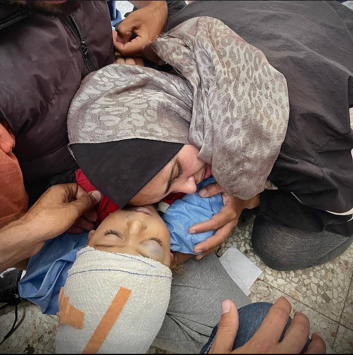 Timesofgaza's tweet photo. "Wake up my son, wake up my soul" 

It's been 200 days and 75 years. 

This is parenthood in Gaza https://t.co/Q7qLRxCsi1