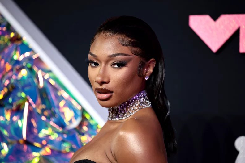 PopCrave's tweet photo. Megan Thee Stallion is facing a lawsuit from a cameraman after she allegedly forced him to watch her have sex in a car.

After the incident, he claims that she told him, “Don’t ever discuss what you saw” and then “berated him” and made “fat-shaming comments” towards him. https://t.co/tSnKO5bAPl