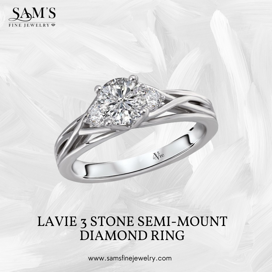 LaVie's 3 Stone Semi-Mount Diamond Ring embodies the journey of love with its twisted 14k white gold band. Surrounding the three-stone diamond center, this design symbolizes your past, present, and future together.  

#samsfinejewelry #bridaljewelry #diamonds