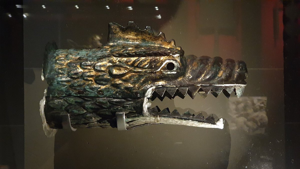 Dragon day. From the AD 100s this is a Draco. A dragon head for the top of a standard in battle wielded by the nomadic Sarmations in what is now Northern Iran. A windsock affair from the back made it fly and roar as it was carried.
