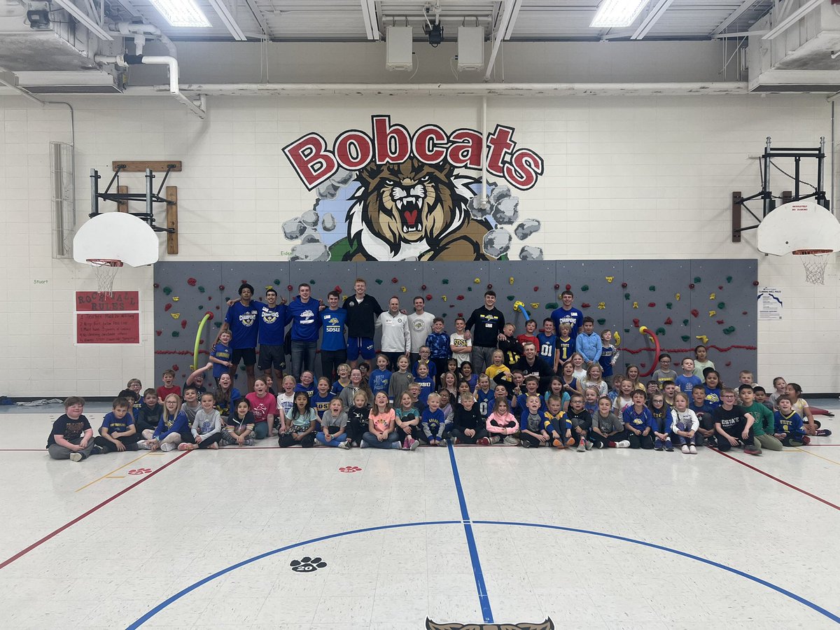 What an awesome day! ☺️ Pretty special to live in a community where your college basketball team will come spend time with our learners at school! 💙💛 Thank you <a href="/GoJacksMBB/">Jackrabbit Men’s Basketball</a> for making memories for these kids that they’ll never forget!! 🏀🫶🏻 #CEO #hulahut #jackswin