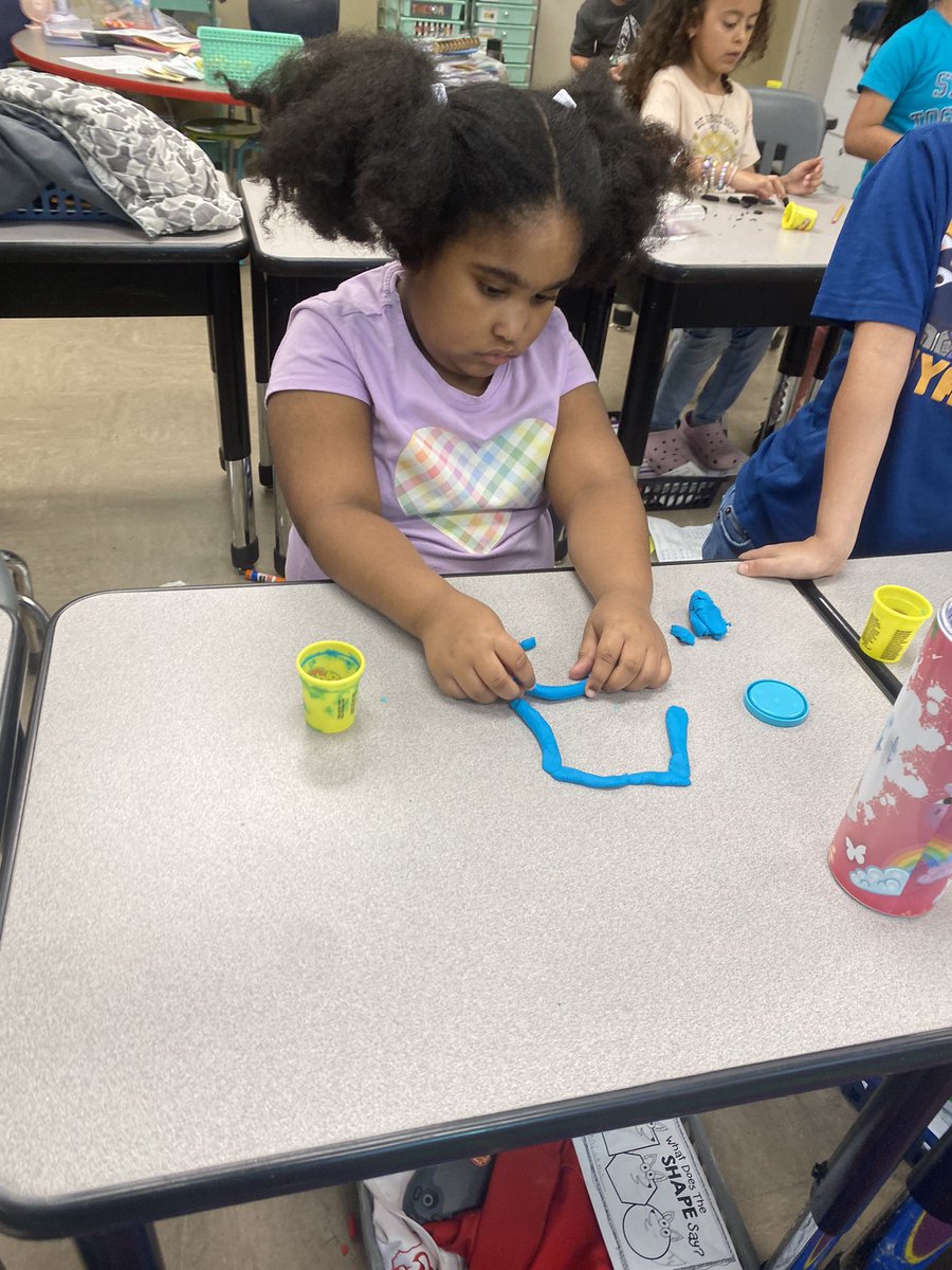 Learning 2D shapes in math. We rolled them out in play-dough and talked about the sides and vertices. @CrosbyElem @CrosbyISD