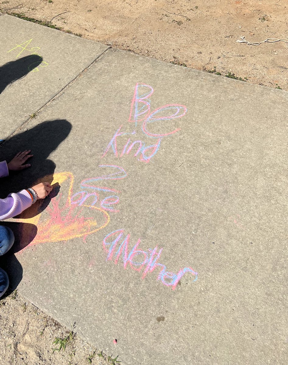 Kindness club members wrote some positive messages on the playground sidewalk to brighten up someone’s day ☀️💙 #KindnessMatters