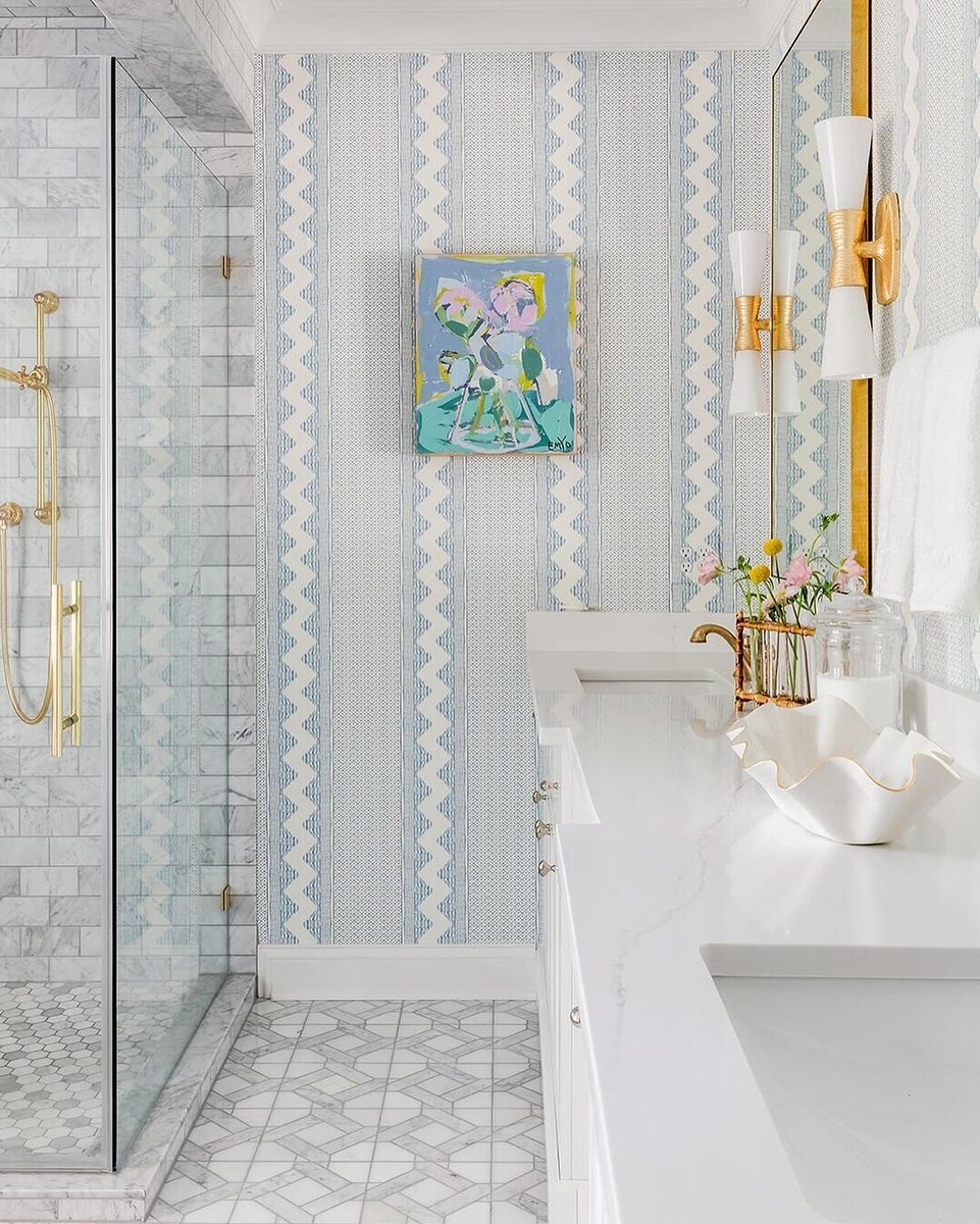 Infuse your bathroom with personality and charm by incorporating a playful wallcovering. From bold geometrics to vibrant colors, let your walls become a canvas of whimsy and style. Featuring: Whitaker Paper Designer: @yssinteriordesign Photographer: @marycravenphotography