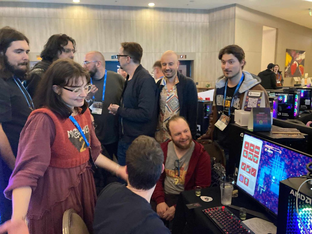 my favorite moment of @RebootDevelop so far, everyone gathered around a janky game jam spaceship building student game @Sosowski @tha_rami @newjorg @Stutsies