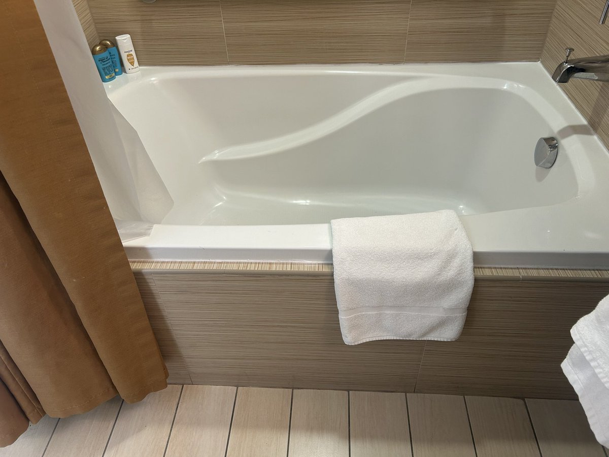 kat_mattp's tweet photo. @WyndhamCEO @WyndhamHotels how do I get a refund for the disastrous vacation at the Deerfield, Fl location? Asking for a handicap room means you have a handicap person staying at your resort! How should they step into a 2 foot high bath/shower? handicap people don’t shower? https://t.co/Wne8Ll9eEI