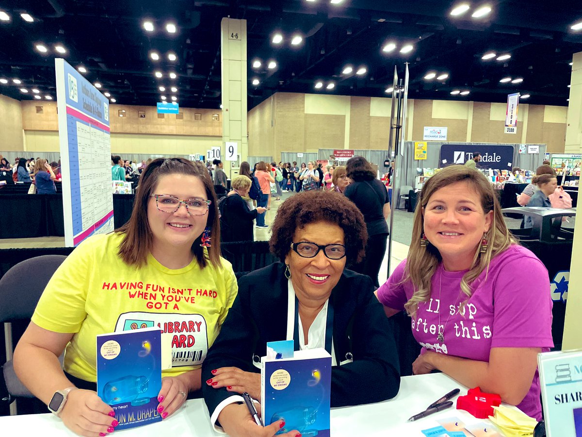 The best part of my day? Getting to show two students that @KScottLMS & I got to meet @sharonmdraper at #TLA24 last week! We talked about how excited we are for the 3rd “Out of my Mind” book & how much this book changed us for the better. I love being a librarian 😊 #navproud