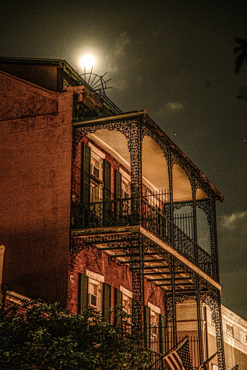Moon and iron lace, Ursulines avenue, New Orleans