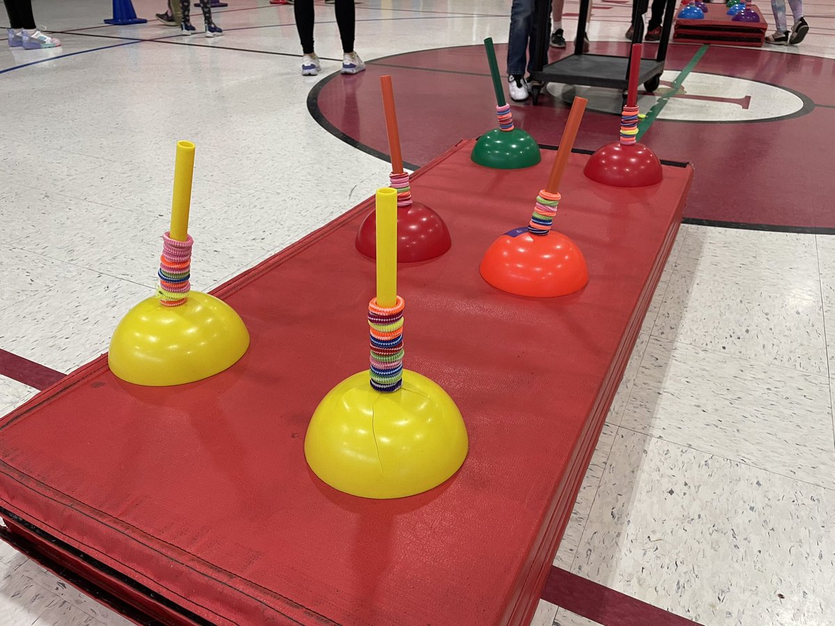 Today we did an activity with dribbling and every time they completed the task, they got to place another scoring ring on the pole. What are some other ways your students track their score during an activity? #physed #elempe