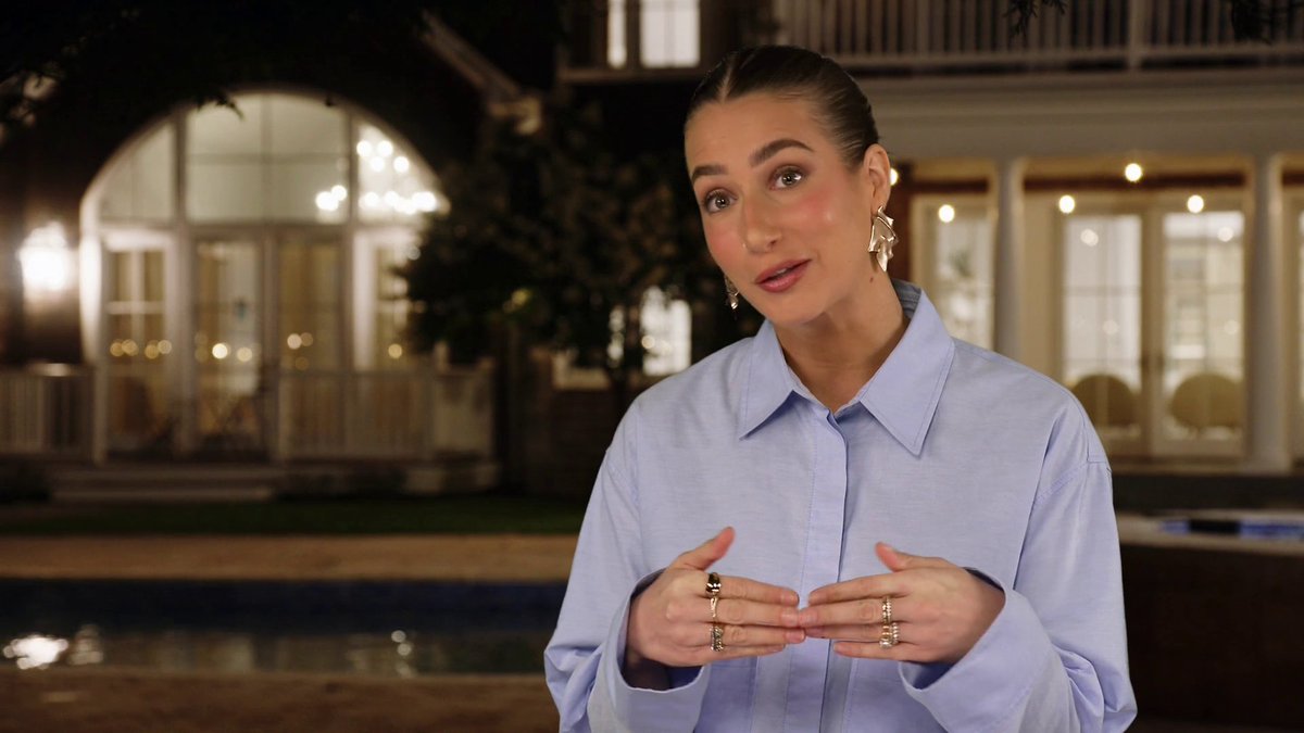 Haunted by this button up. She's dressed like Nathan Fielder impersonating Hailey Bieber.