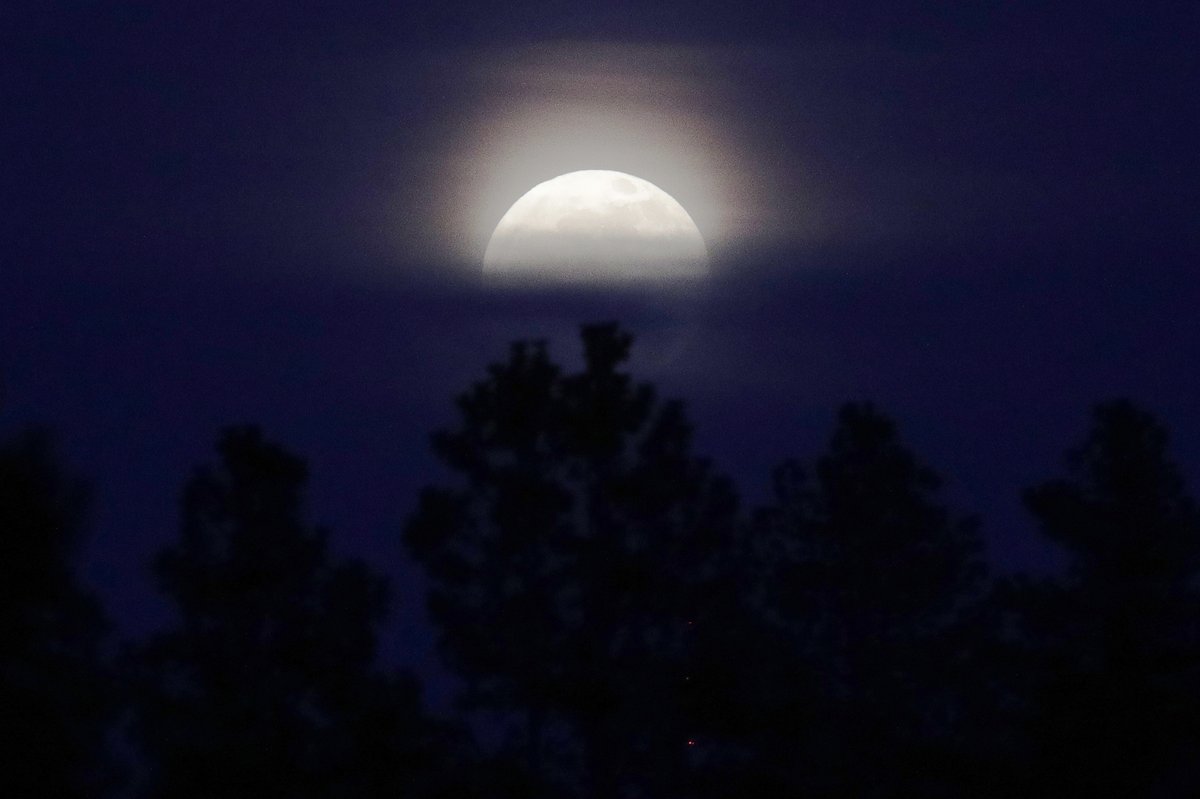 Full Pink moon, Tuesday, April 23, 2024, in Spokane, Wash.