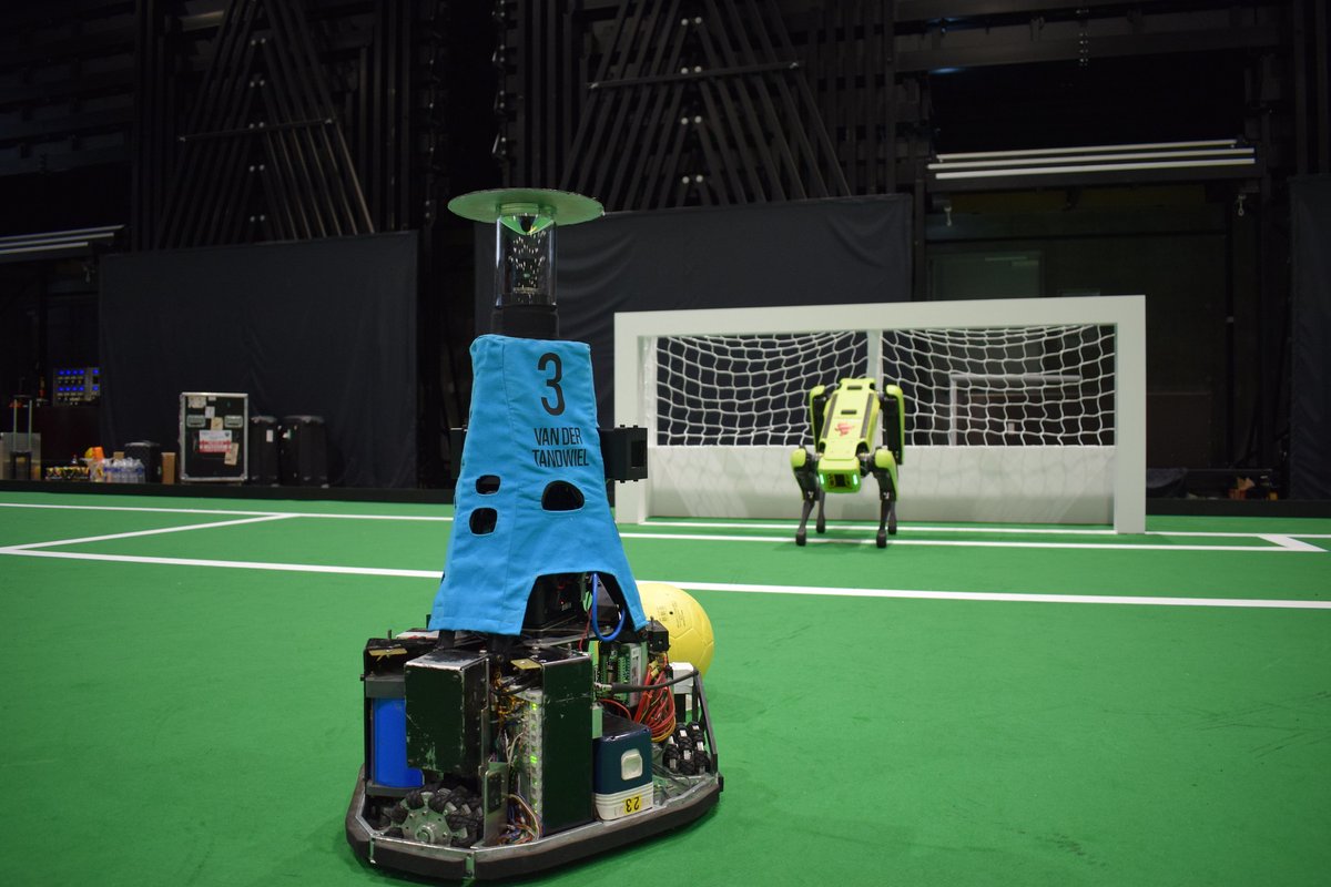 TechUnited's tweet photo. Can SPOT, our robotic dog 🐾, save the day on the soccer field? Imagine SPOT stepping in to block that crucial shot on goal! 🥅

#Robot #Tech #Innovation #Soccer #Service #Zorg #HERO #Student #Team #Tue #Robocup #Eindhoven #Worldcup #Championship #Champions #SPOT #Goal #Keeper https://t.co/L7WWUxa70r