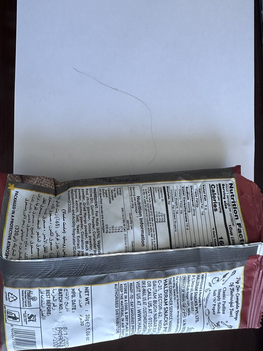 AMRENsingh's tweet image. Pathetic experience found hair in #magicmakhana pack from @MyHaldirams @haldiramfoods @DMunicipality @foodsafetydubai