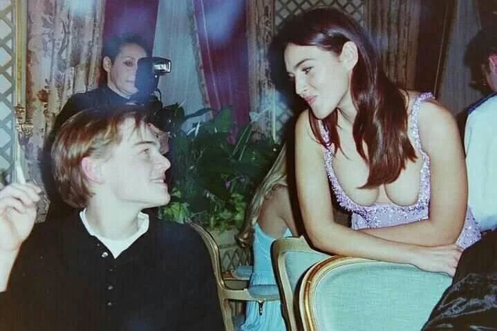 Young Leonardo DiCaprio with Monica Bellucci. 1995