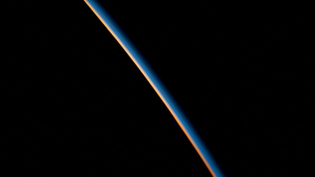 The last rays of an orbital sunset illuminate the Earth's atmosphere in this stunning shot from the International Space Station. (Credit: NASA)