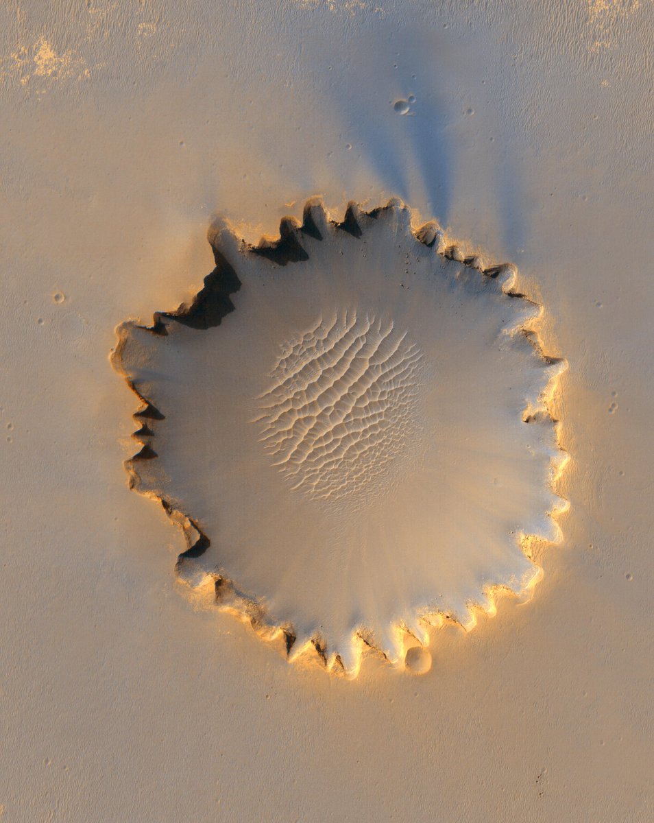 Victoria Crater at Meridiani Planum - This image from the HiRISE instrument on NASA Mars Reconnaissance Orbiter shows Victoria crater, an impact crater at Meridiani Planum, near the equator of Mars. NASA