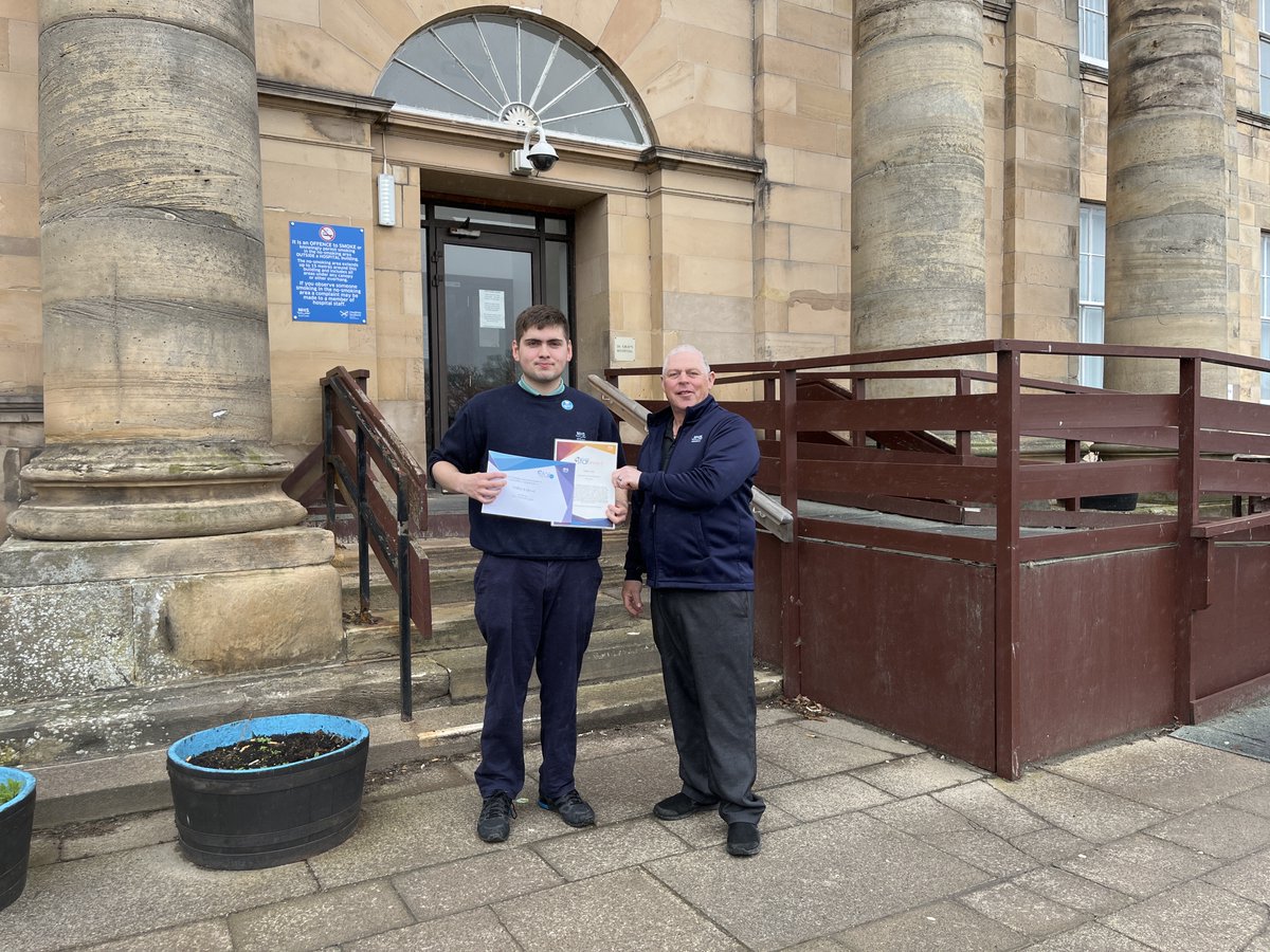 Star Award Winner William Lloyd, Porter from Dr Gray's being presented his award by George Sutherland, Team Leader. #proudtobenhsg