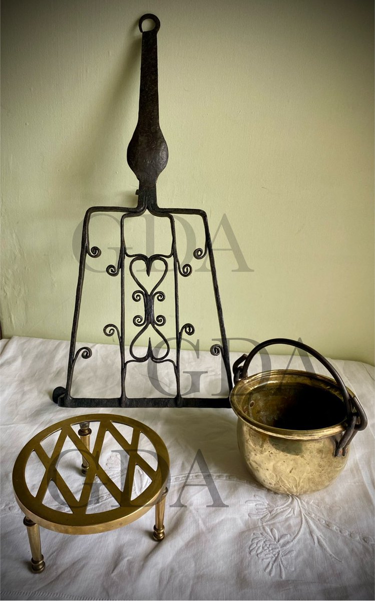 💚💚💚💚 Good morning #EarlyBiz A trio of fireside items. A hand wrought iron trivet, a, W Tonks & Sons brass trivet and a brass cauldron or pot. See them & more at Dieudonneart.com/antiques #fireside #trivet #antiques #collectables #brass #Interiors #shopindie #elevenseshour