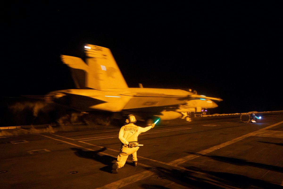 Ready, Aim, Fire! 🔫🎯

#MightyIKE’s catapult officers, or shooters, verify that all pre-flight checks have been completed and everyone on the flight deck is in position to commence flight operations.
#WeLikeIKE | #AlwaysReady | #GreaterEachDay