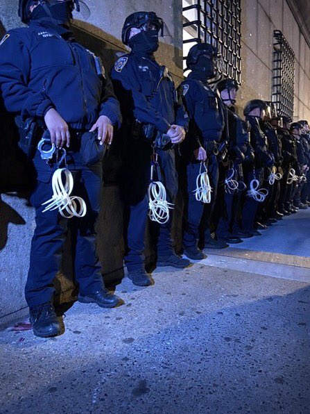 New York police officers getting ready to detain student activists at Columbia University