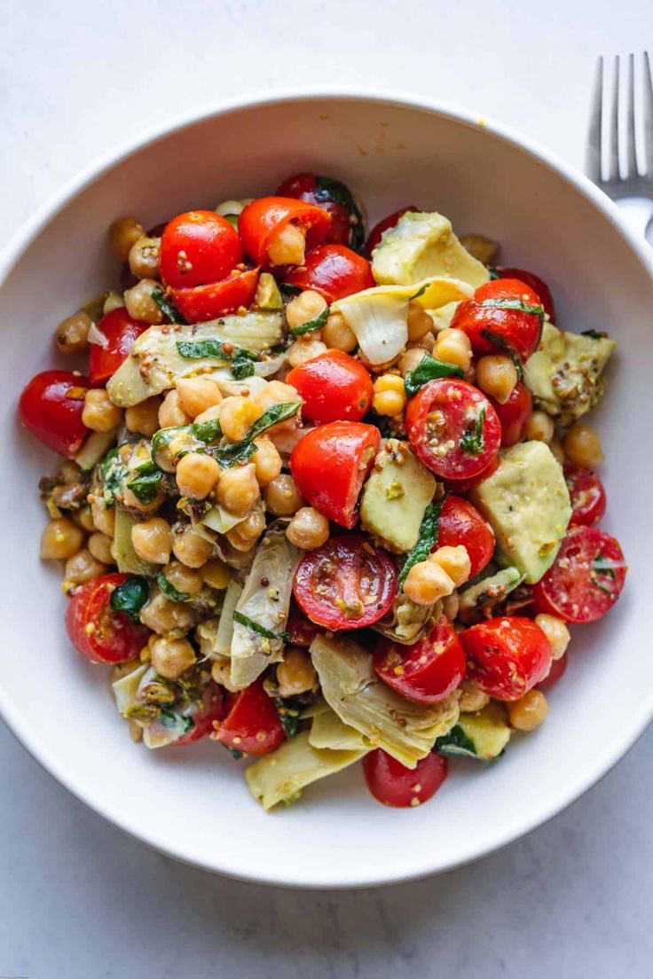 wehealthy3's tweet photo. Healthy vegan protein salad with avocado, artichoke, 1 cup chickpeas, mint leaves , red tomatoes, mustard oil , onion , lemon juice for taste . #vegan #healthy #food #protein #minerals #nodrugs #nowar #trending #liveonce #yolo https://t.co/u7bxcgkftb