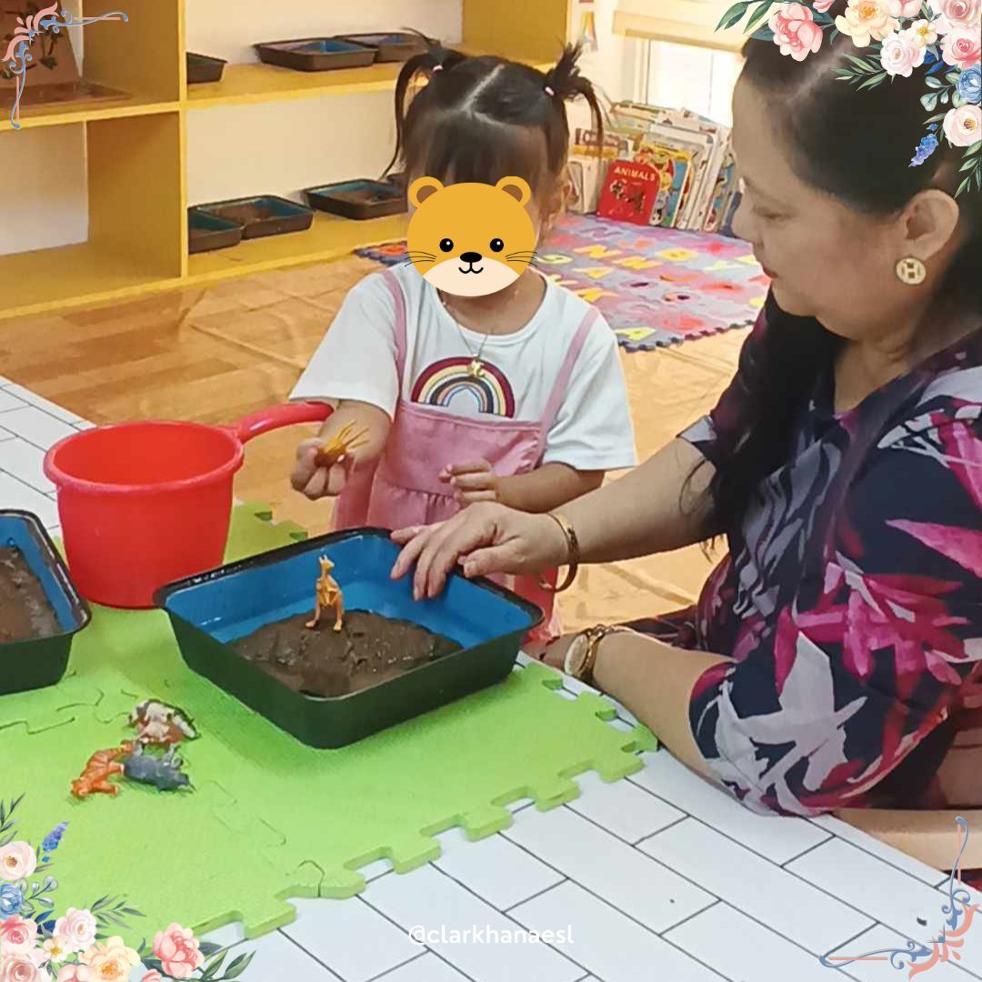 In Montessori teaching, letting kids touch mud or play with their hands is super useful. It helps them learn about textures, shapes, and nature. Plus, it boosts their creativity and problem-solving skills. 

#montessori #clarkhanaesl #preschool #kids #sensoryplay