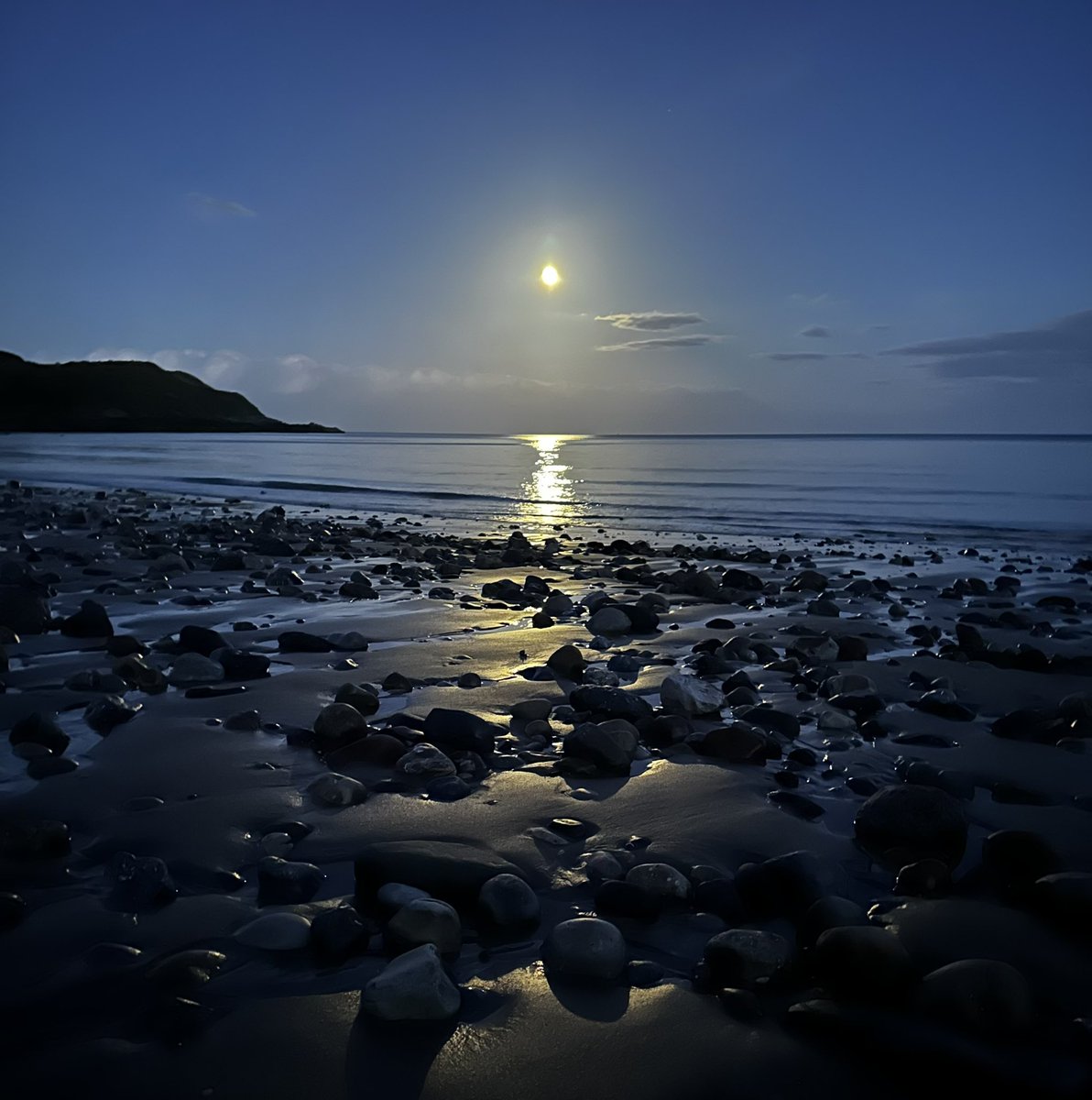 Moonrise over Langland Bay.