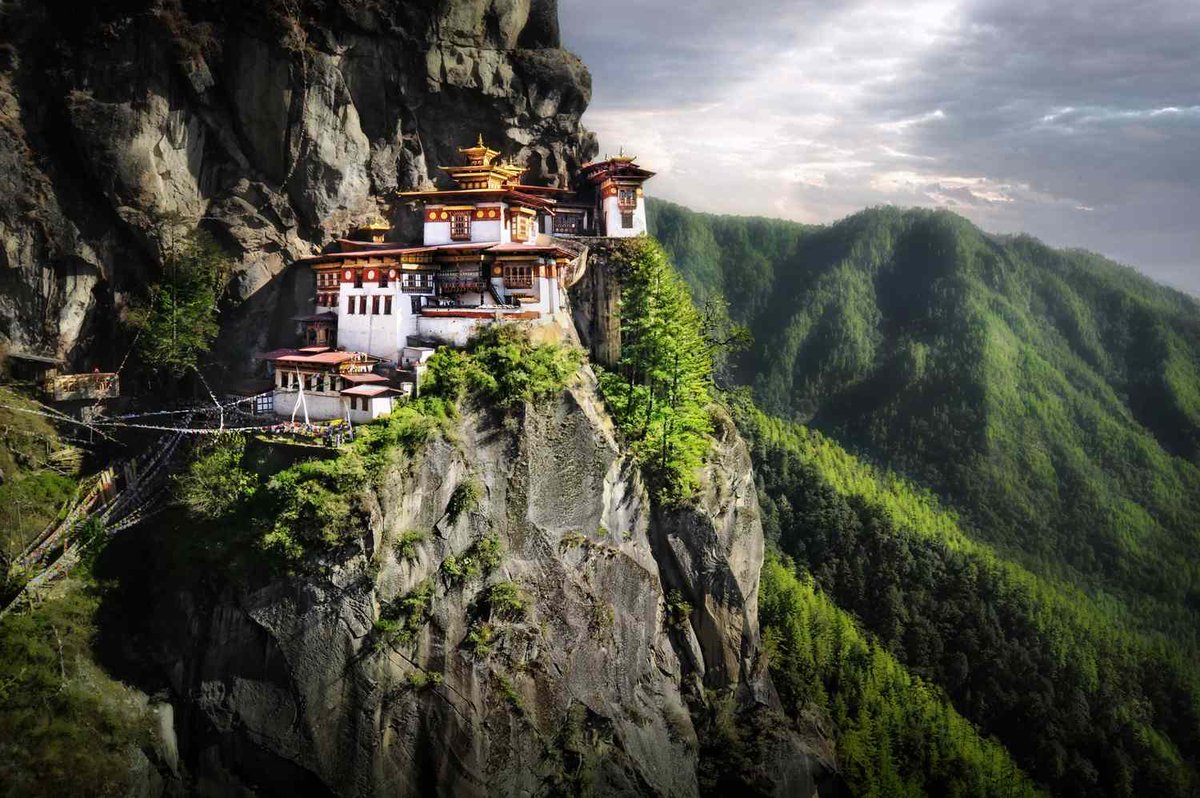 Bhutan is the land of Happiness. But you know the secret? :)

One key ingredient seems to be the consumption of Doma (Paan), almost every adult is seen chewing Paan, yet they never paint the walls red. It’s said during the construction boom there, the Bihari Nepali workers