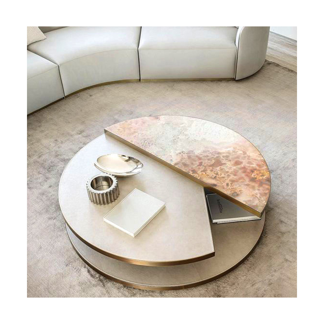 This inspirational piece captures a scene of understated elegance. The centerpiece is a study in contrast and harmony with a crescent of marble accented by a brass edge. Perfect for a contemporary interior @rugiano_interiors

#bespoketable #coffeetable #sculpturalfurniture