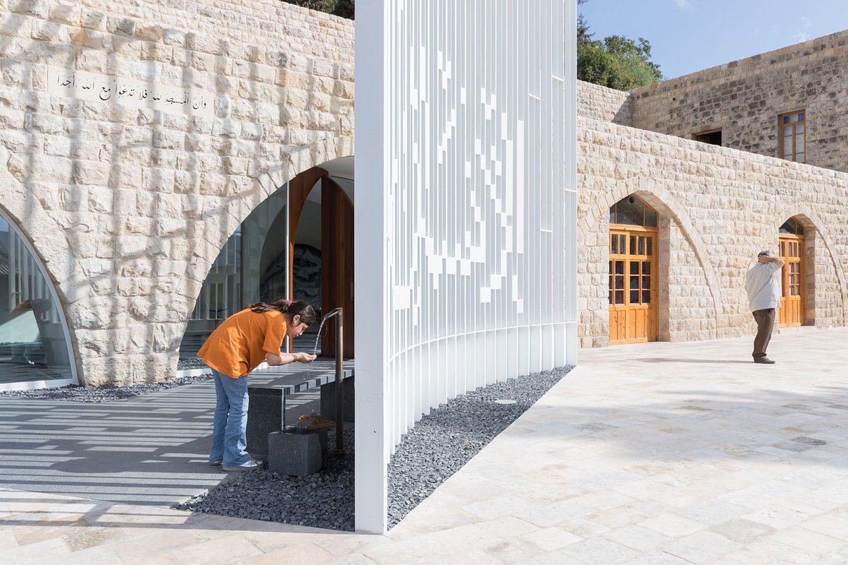 View of the ablution fountain in Amir Shakib Arslan Mosque in the rural village of Moukhtara, Lebanon, completed in 2016 and made from steel and stone. buff.ly/40vFZnF #ContemporaryArchitecture #mosque #Lebanon #StoneConstruction #steel