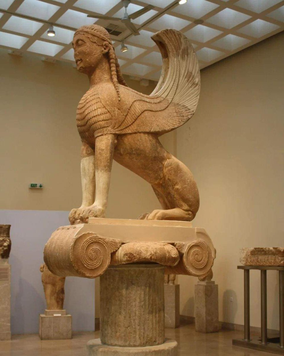 The Sphinx dedicated to the oracle of Delphi by the state of Naxos, 560 BC. Originally, it was placed atop a 10 m tall Ionic column. (Delphi Archaeological Museum). The Sphinx of Naxos stood on a tall Ionic column next the famous Temple of Apollo at Delphi, the religious center