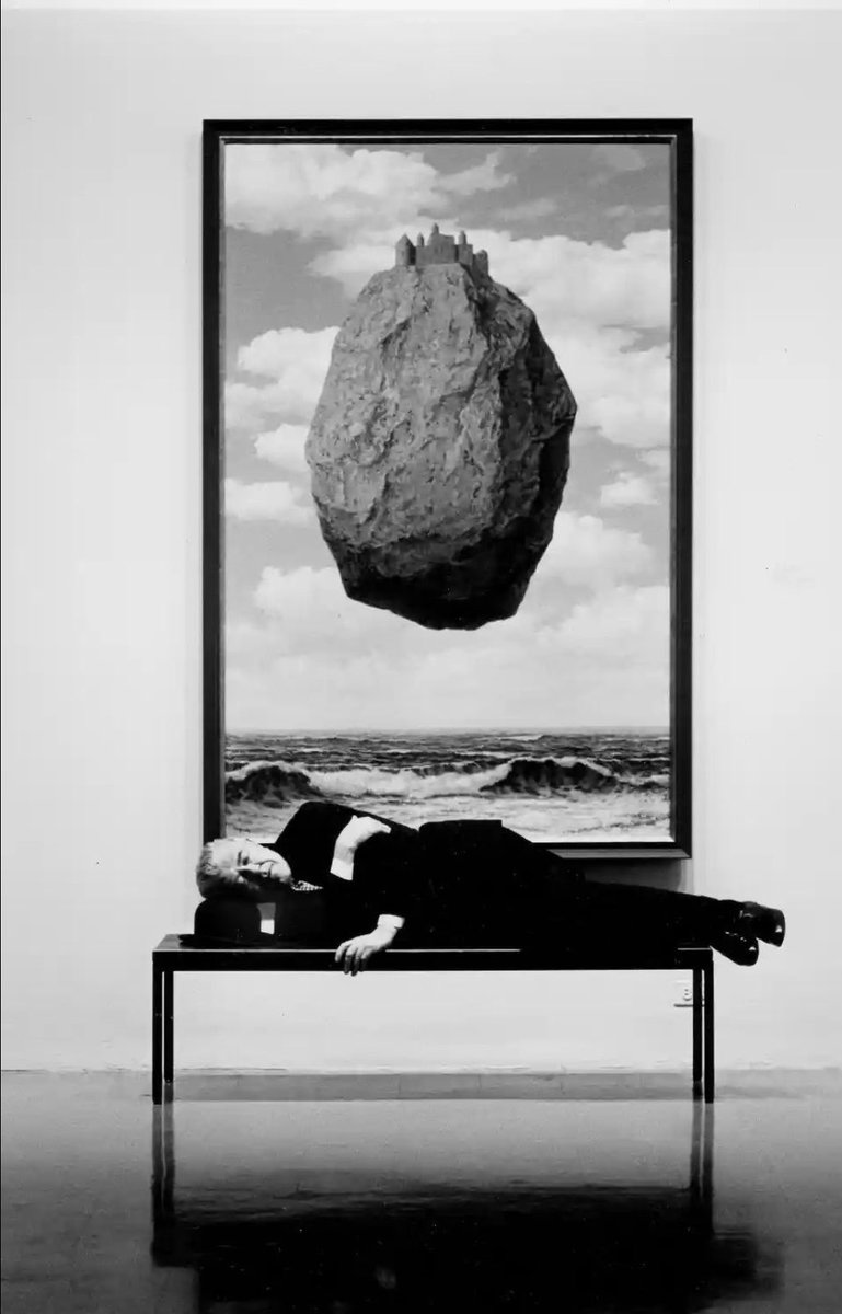 Photograph Steve Schapiro, 
Rene Magritte Sleeping at MOMA, New York, 1965.