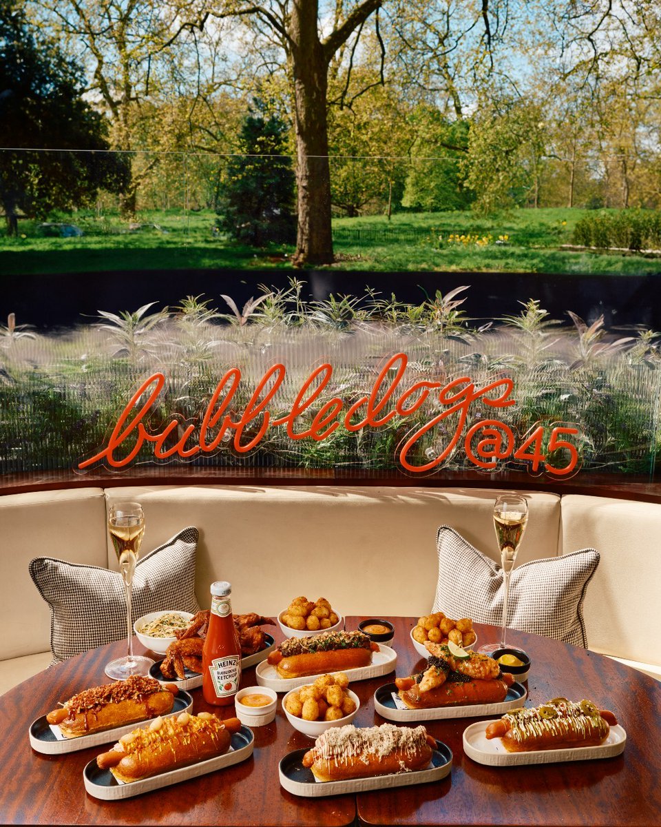 45ParkLaneUK's tweet photo. Grab your sunglasses and join us on the CUT OUT terrace for Bubbledogs @ 45 this summer! 🌞
Bubbledogs is back, exclusively at 45 Park Lane from Friday 10th May, where we will be serving gourmet hotdogs, grower Champagne and radiant sunshine. 🌭 🥂 #Bubbledogs #45ParkLane https://t.co/hnSNKZPTGC