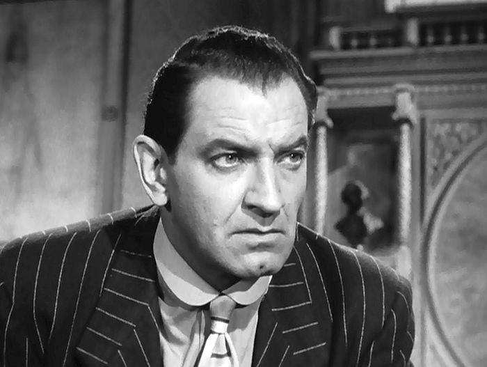 LvClassicFilms's tweet photo. From the NYT obituary on #BruceGordon in his role as Frank Nitti: “granite-faced, gravel-voiced, looked as though he had been carved from stone,filled with menace, pinstriped, scowling &amp; looming so large he seemed to crowd the borders of the screen.” Always a pleasure to watch. https://t.co/gaFzI0slDh