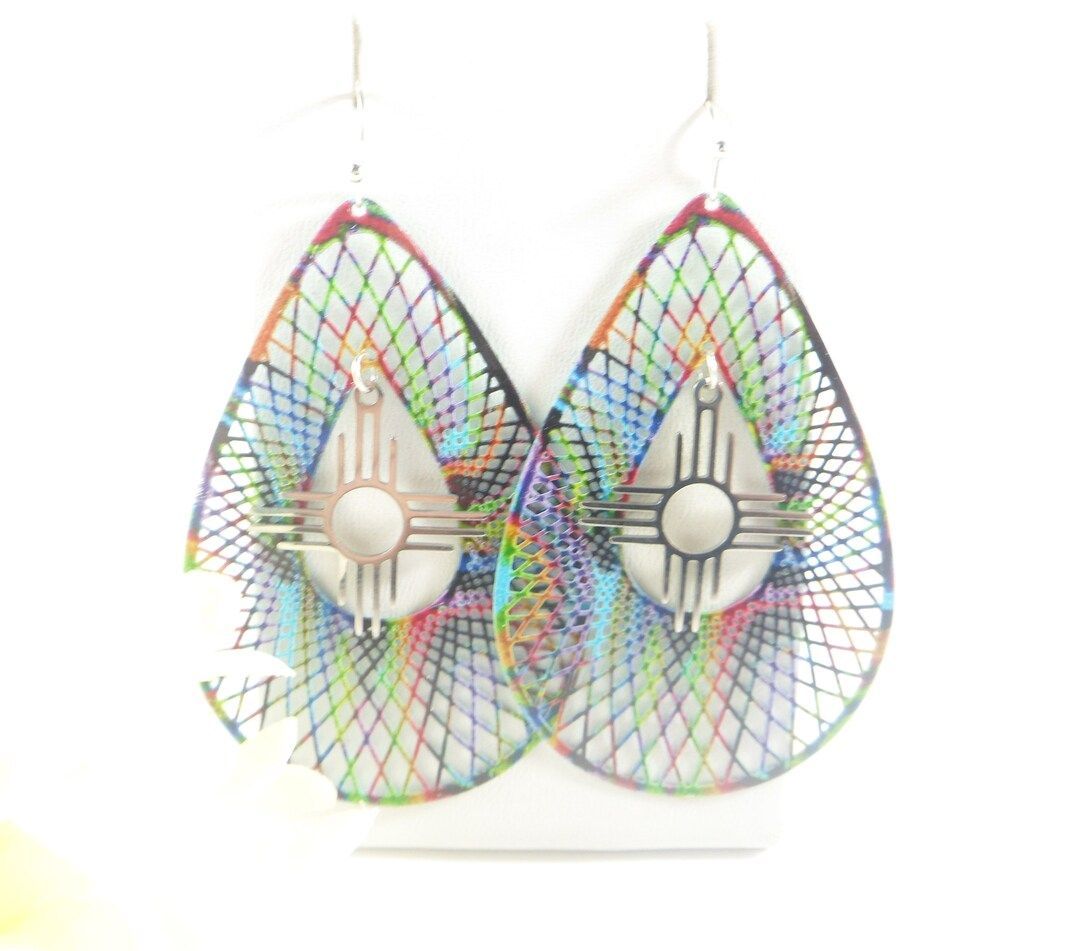 Discover the elegance of our large lightweight multicolor teardrop Zia charm earrings!  buff.ly/3Wf2HkS  

#SantaFe #NewMexico #etsyshop #Albuquerque #etsyjewelry #shopsmall #wiseshopper