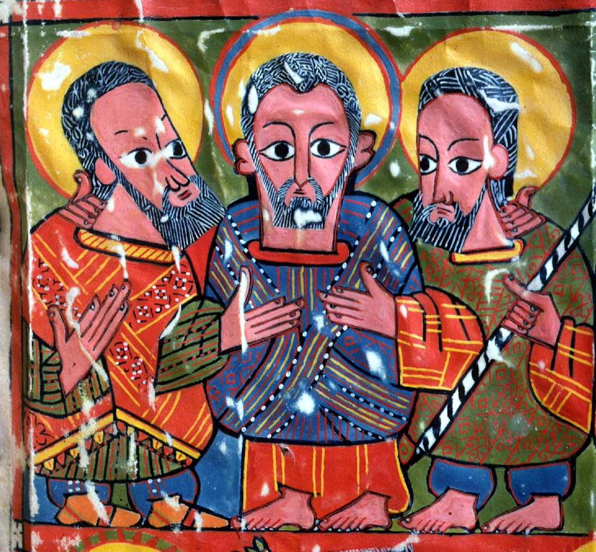 Parchment is an organic material, so the surface of a leaf is rarely completely even. On this illumination, the color of some protruding parts has been worn off, leaving white areas. The three Old-Testament Patriarchs (Ethiopia, 15th–16th c.) #abraham #patriarchs #africanart