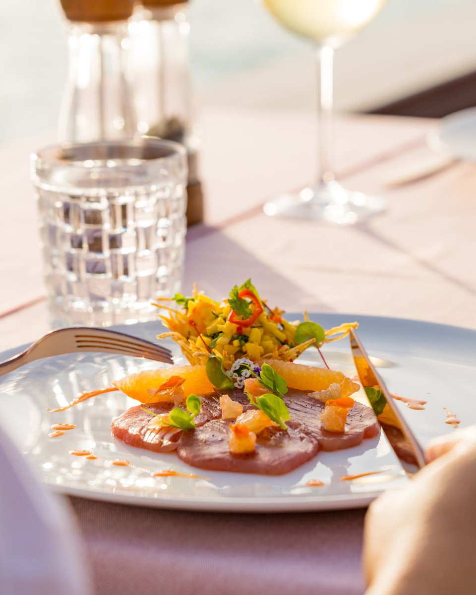 Savour a delectable alfresco lunch amidst the scenic beauty of Milaidhoo. A culinary delight served with a side of breathtaking views.
