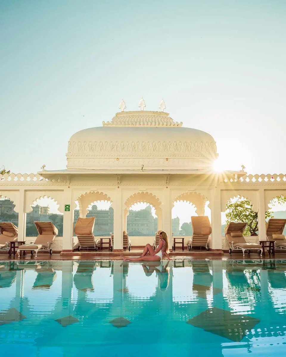 As the radiant sun gracefully pirouettes above the serene expanse of sapphire waters, let yourself be captivated by the serene beauty of this heavenly paradise. Photo Credits: @ebruperera #TajHotels #Tajness #TajLakePalace #LivingLegaciesOfTaj