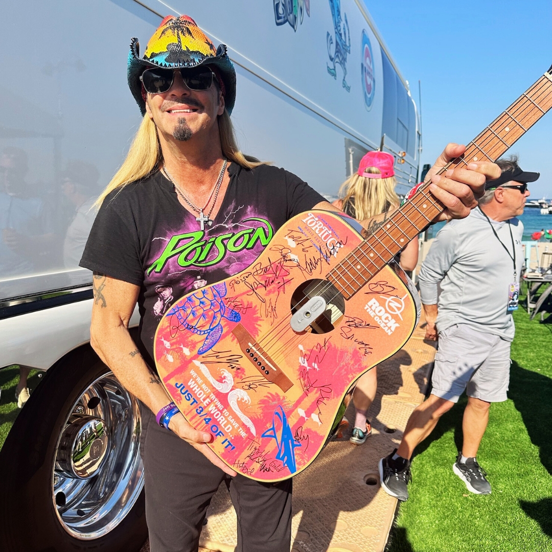 🎸🤘 #BretMichaels absolutely ROCKED stage AND the ocean this year at Tortuga! Not only did he sign a guitar, but he met one lucky fan with all proceeds going to the Rock The Ocean Foundation. 🐠