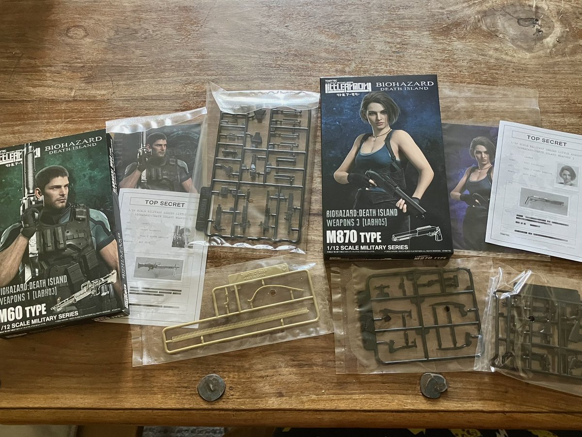 my mini weapons from the Resident Evil: Death Island movie came today. Don’t have the tools to assemble them but still :3