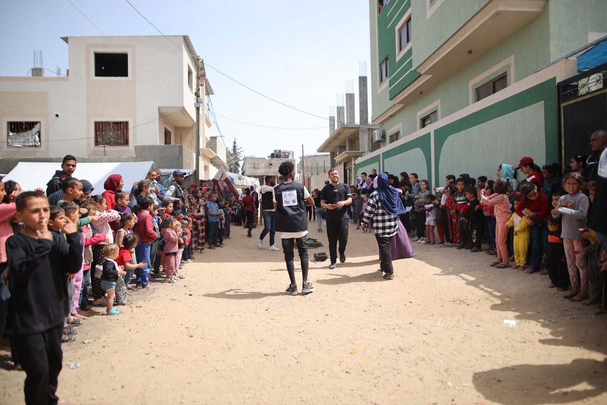 'For over six months, we've struggled to find laughter amidst the overwhelming sadness and tragedies. Yet today, we found a moment of joy.' - Dr. Nour, Doctor with Project HOPE Project HOPE and @SharekF held an activity to promote play and well-being for children in Rafah, Gaza.