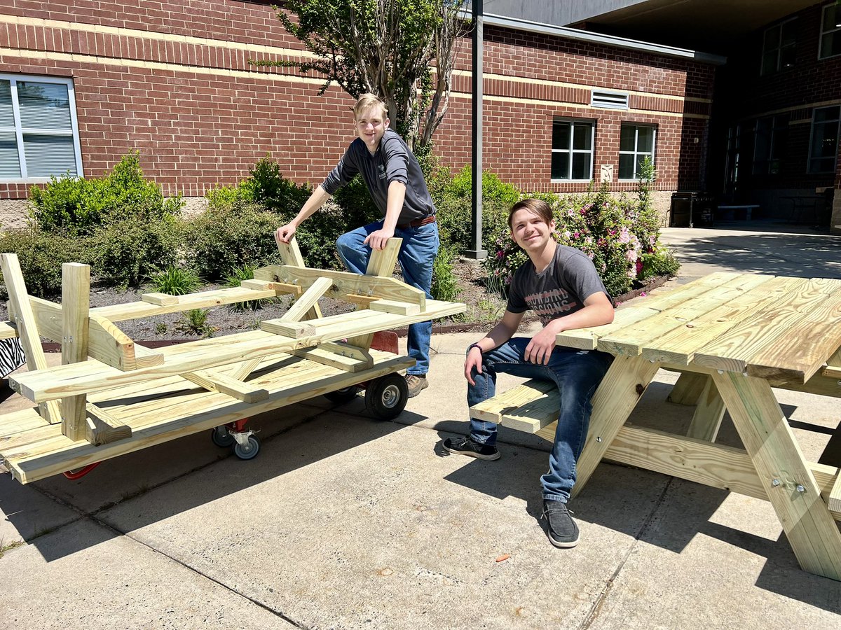 Mr. Austin’s Carpentry 2 student &amp; peer helper, Matthew Bradley and Andrew McIntire, constructed four new picnic tables for the Senior Court Yard! They did a great job-learning in action to benefit the school grounds! #cteworksforme