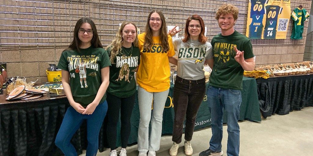 Thanks for shopping with us at the Green & Gold Showcase this weekend! 🤘 Reminder to grab your custom NIL gear and support your favorite student athletes! Shoutout to our friends at NDSU NIL for letting us wear these shirts featuring our very own NDSU student athletes 😎