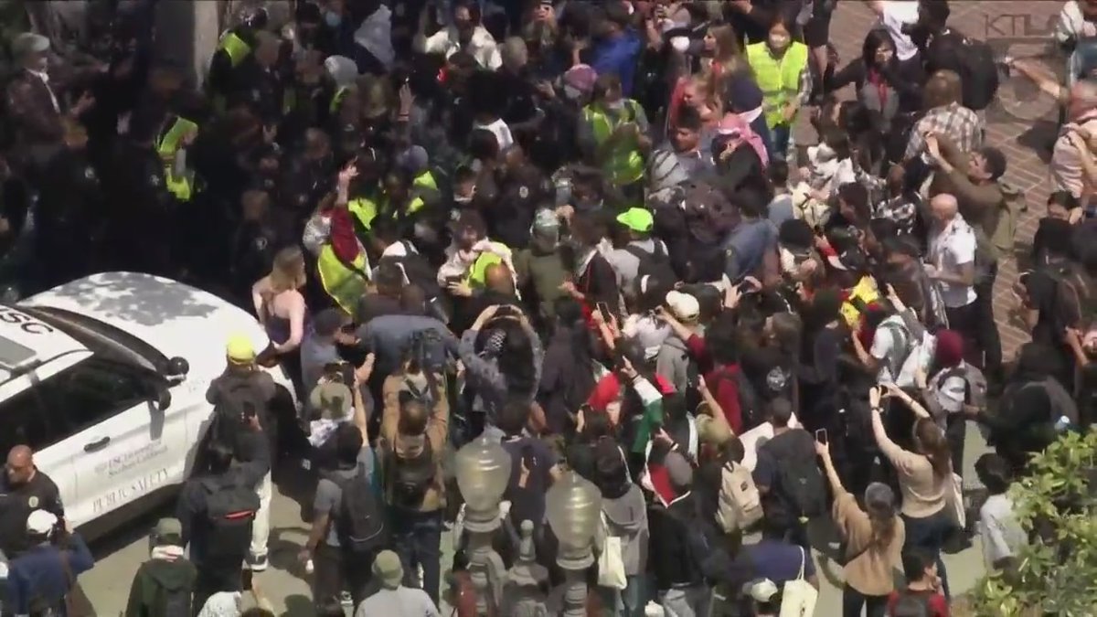 KTLA's tweet photo. #BREAKING: A pro-Palestinian protest on the campus of USC has escalated into a conflict with law enforcement. Watch live coverage: https://t.co/8lwcFYK48e https://t.co/YTn3qHRxH8