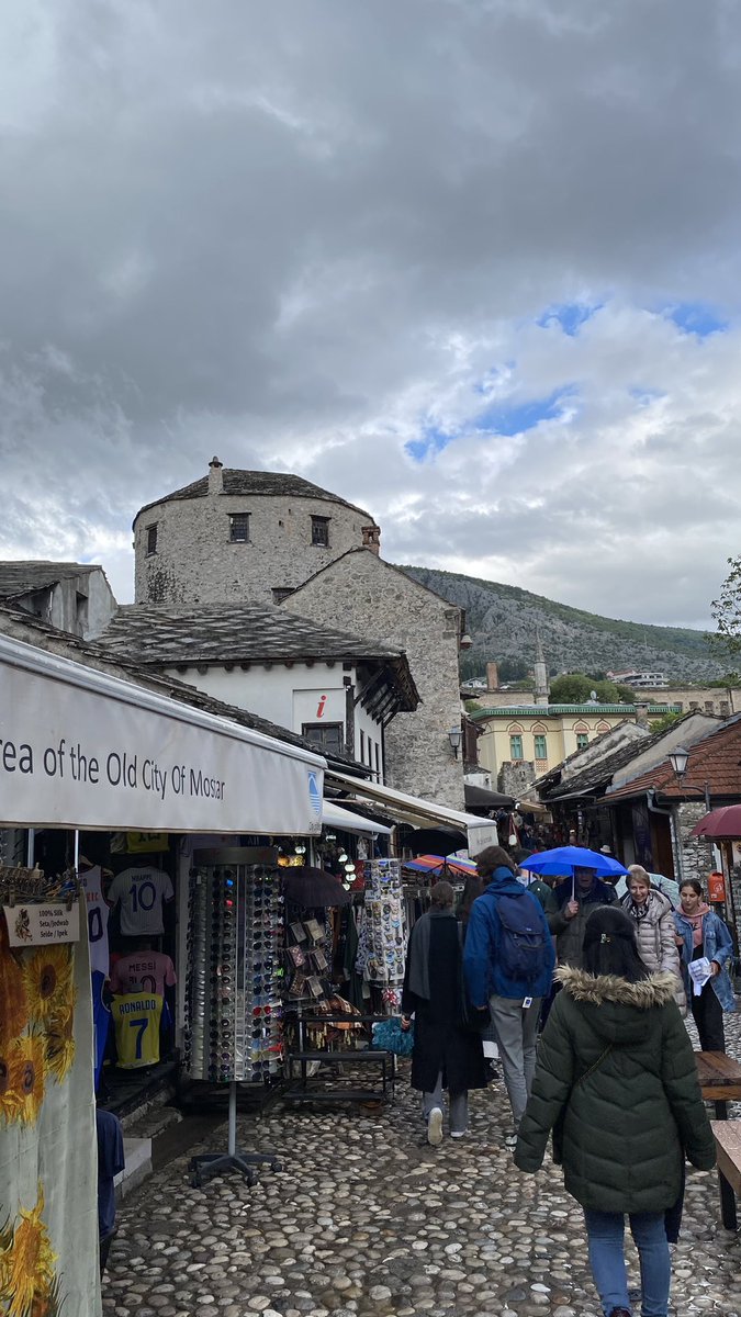 coenatolin's tweet photo. The day continued with a walk through the modern history of Bosnia and Herzegovina, guided by Mr Boris Filipi. As we traversed the iconic bridges of Mostar, we delved into the intricate tapestry of the region's past, where each arch tells a tale of resilience and transformation. Natolin’s #WesternBalkansTeam