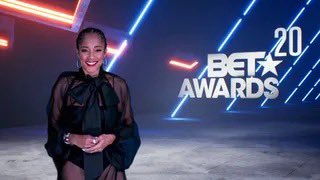 Amanda Seales really hosted the 2020 BET Awards from her living room. Had to do her makeup, hair, and wardrobe all via zoom.